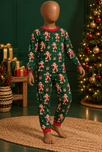 Load image into Gallery viewer, Dancing Santa green pajama set on a mannequin in a Christmas room